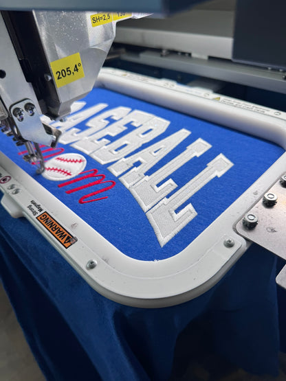 Baseball Mom appliqué T-shirt being embroidered in the studio