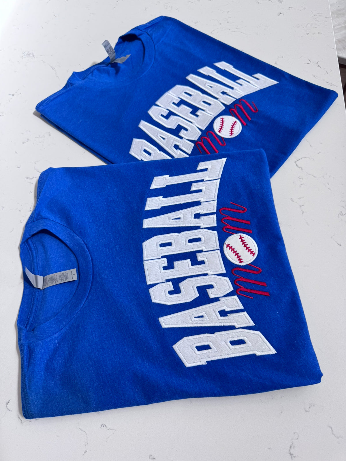 Close-up of embroidered baseball detail on a Baseball Mom T-shirt