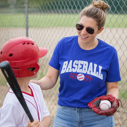 Woman wearing a royal blue embroidered Baseball Mom T-shirt at a baseball field