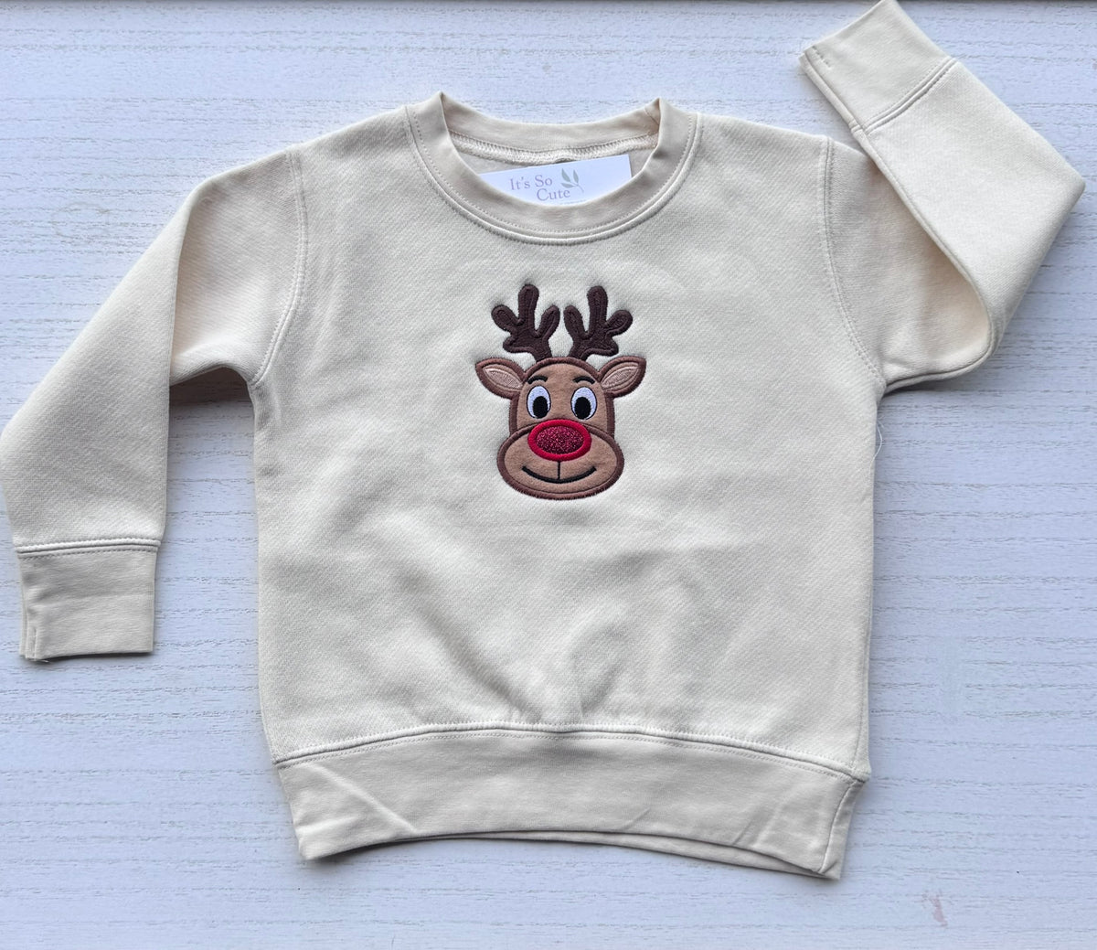 Full view of a Nature toddler Christmas sweatshirt with centered embroidered reindeer design and long sleeves.