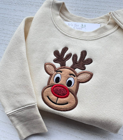 Nature toddler Christmas sweatshirt featuring a handmade embroidered reindeer appliqué with a sparkling red nose.