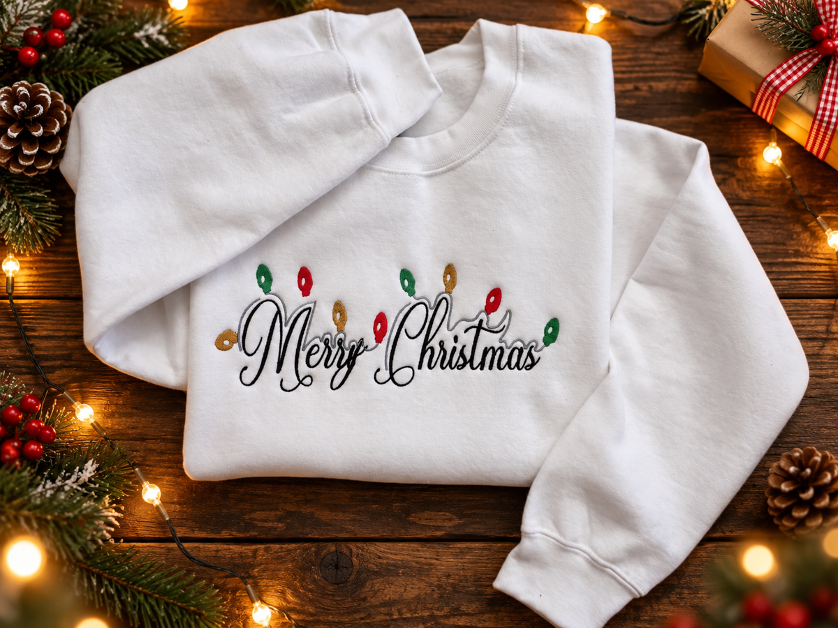 White Merry Christmas embroidered sweatshirt with colorful Christmas lights
