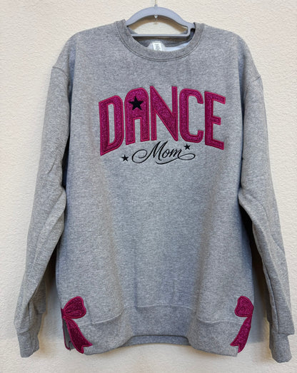 Dance sparkle appliqué being embroidered on a sweatshirt