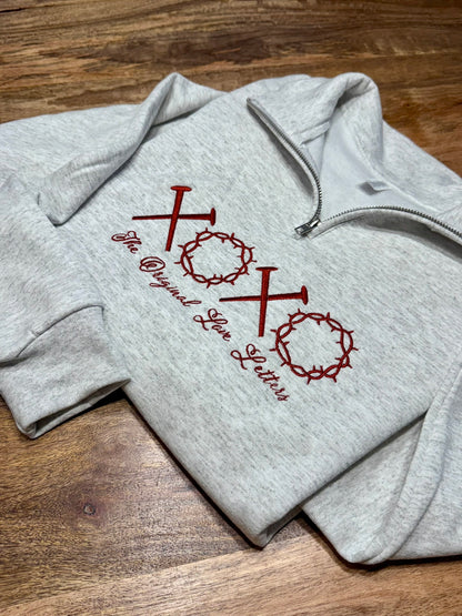 Detail of XOXO embroidery on Christian Love Letters sweatshirt