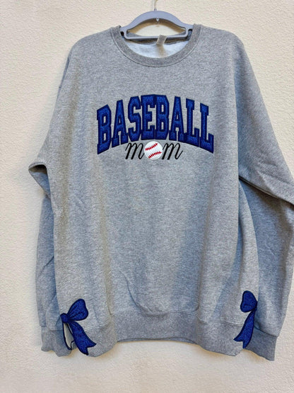Close-up of Baseball Mom custom embroidery detail on varsity sweatshirt