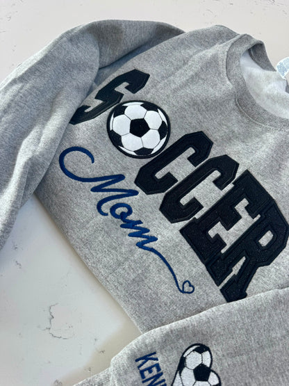Soccer Mom embroidered sweatshirt flat lay varsity appliqué custom name