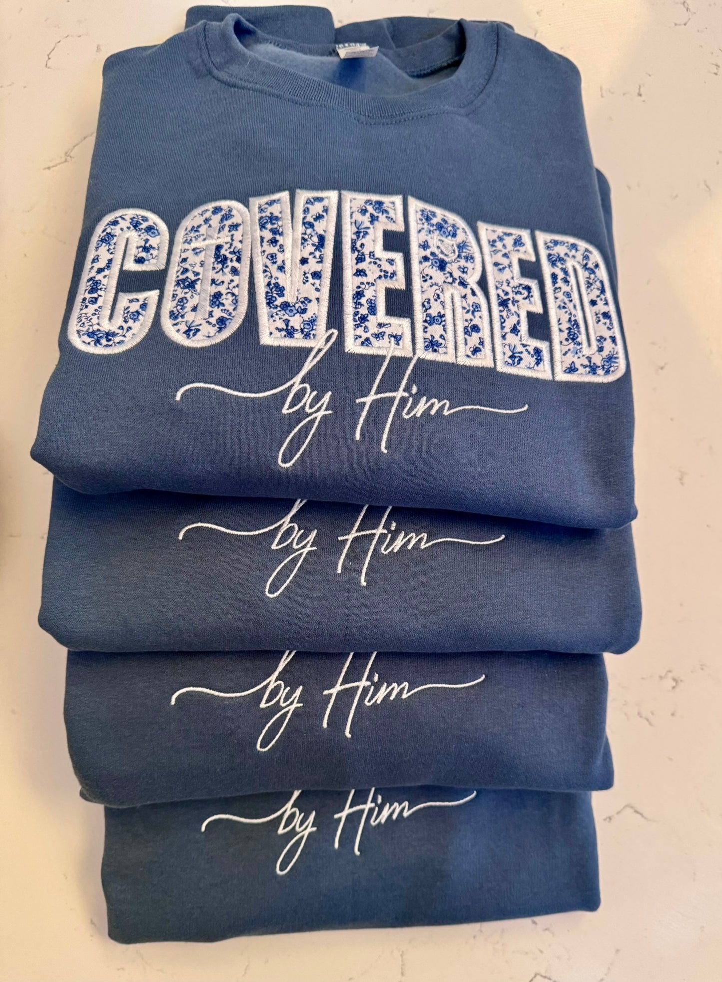 Covered by Him Christian Embroidered Sweatshirt & Hoodie | Floral Appliqué | Faith Gift | It's So Cute®