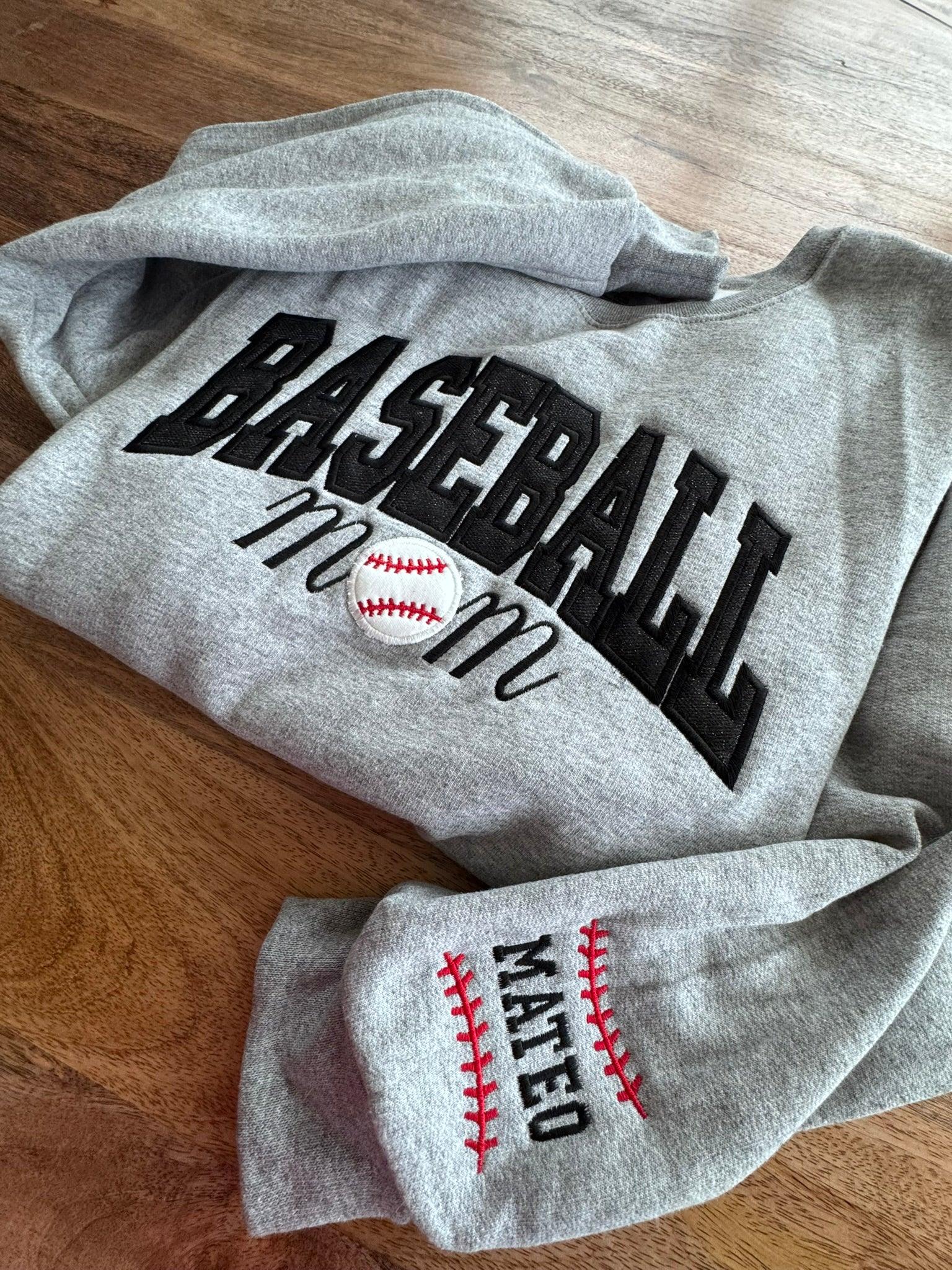 Detail of custom Mama embroidery on Baseball Mom varsity sweatshirt