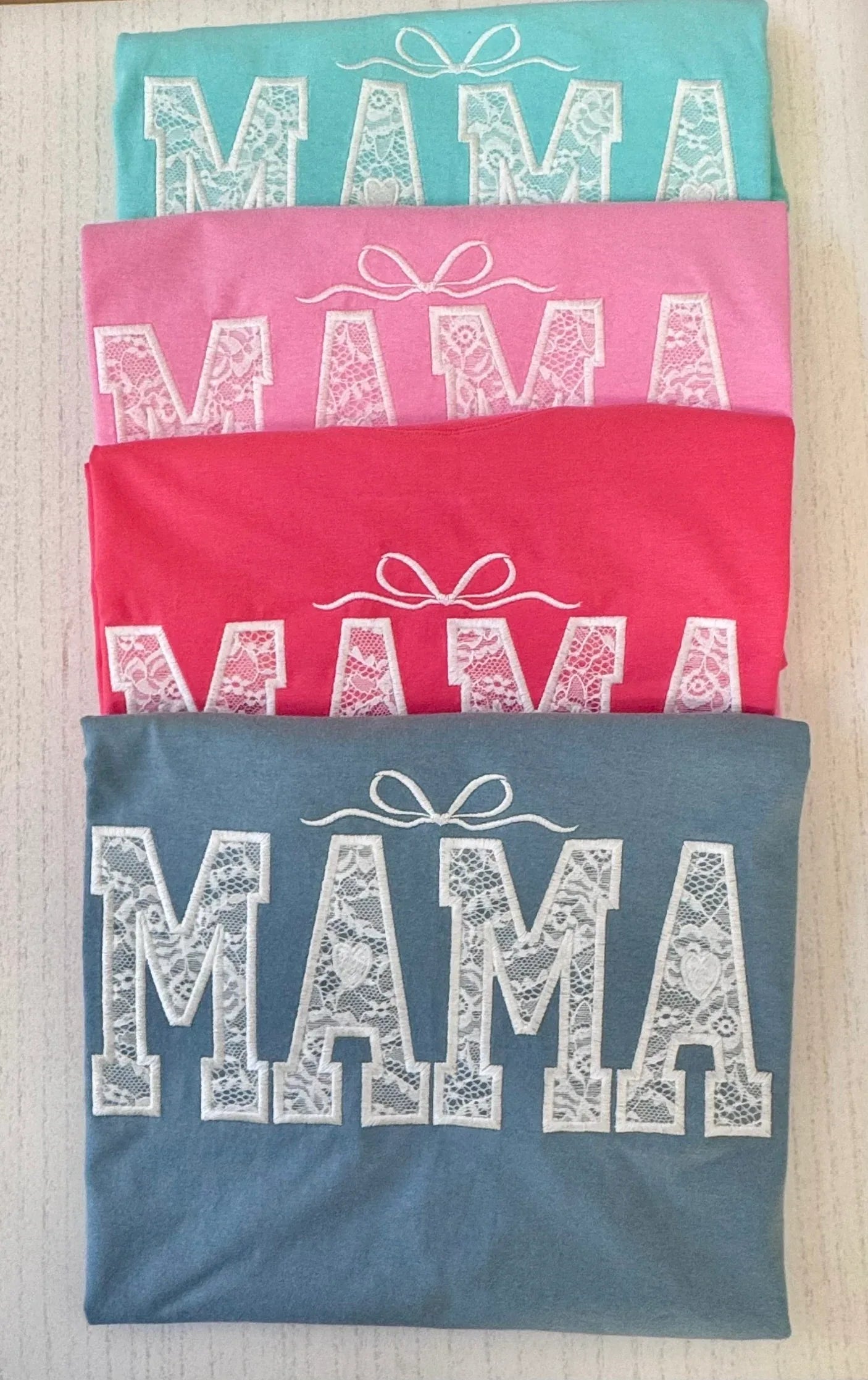 Custom name lace embroidered Mama shirt flat lay view