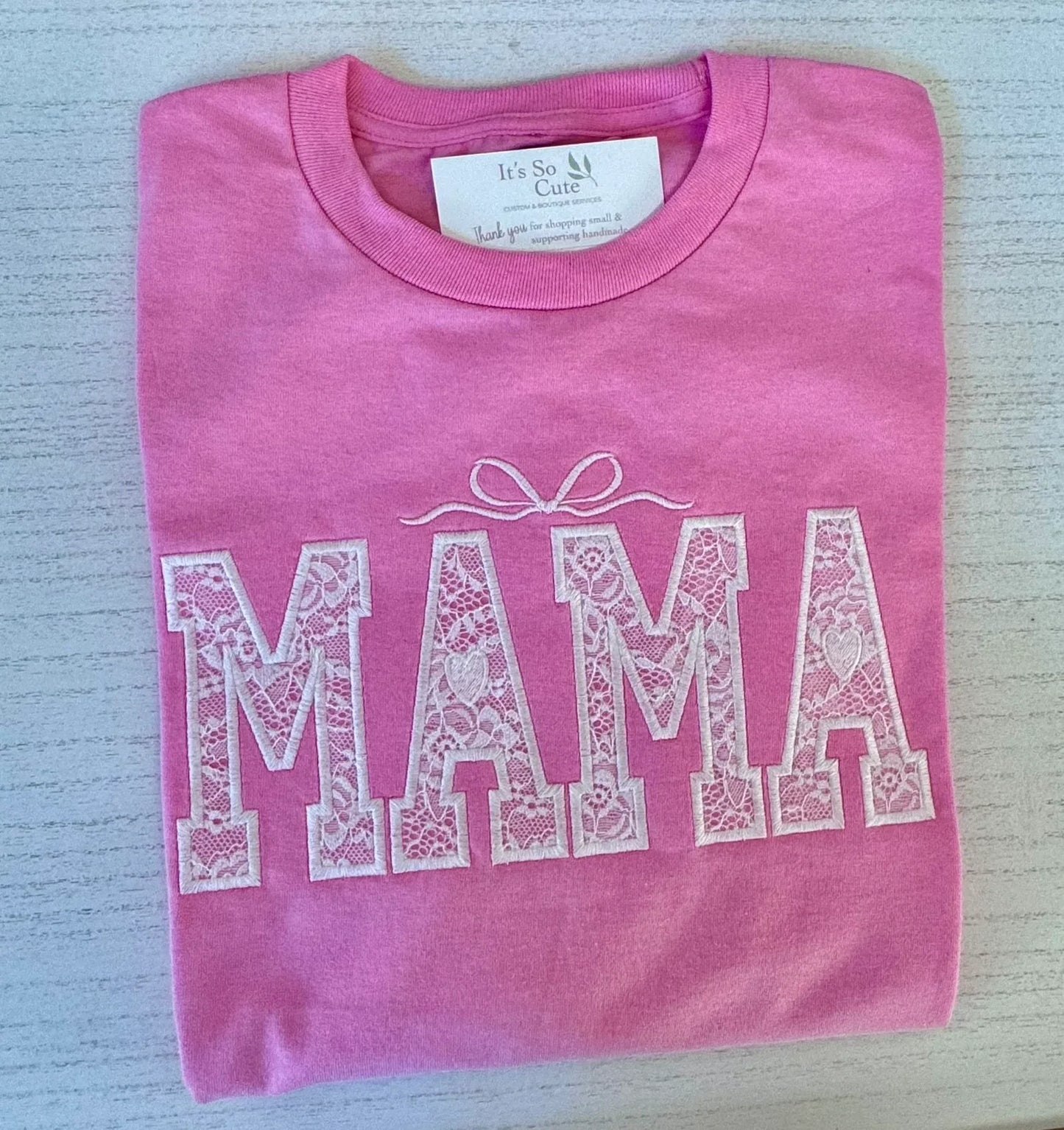Detail of custom name lace embroidery on Mama tee