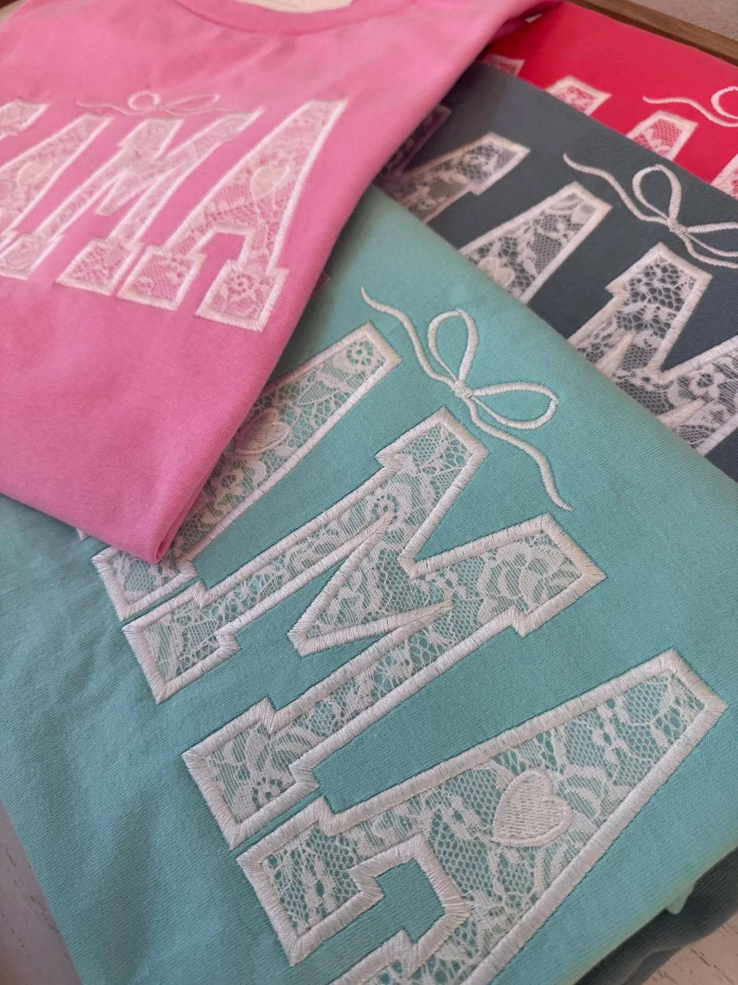 Lace embroidery detail on personalized custom Mama shirt