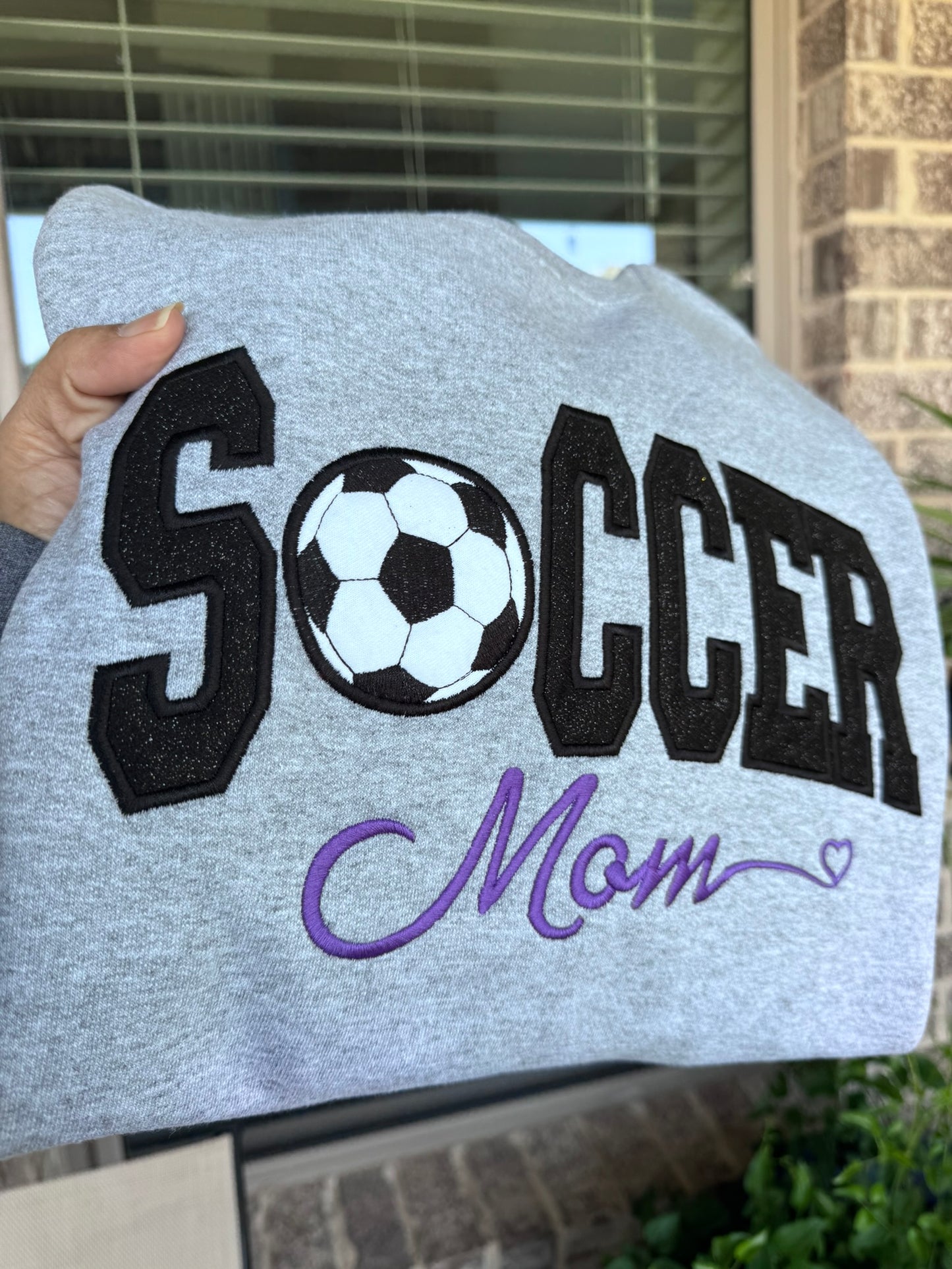 Embroidered Softball Mom Sweatshirt | Varsity Appliqué Crewneck | Custom Sleeve Name | It's So Cute®