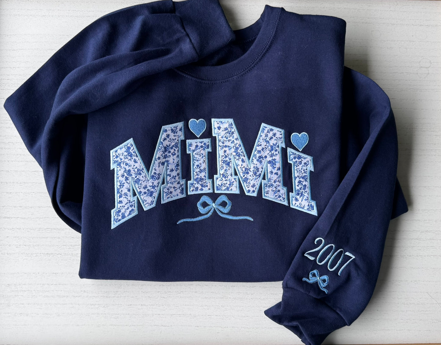Personalized Blue Floral Appliqué Grandma Sweatshirt & Hoodie | Heart Detail | Custom Sleeve Names | MiMi Nana Gigi Gift