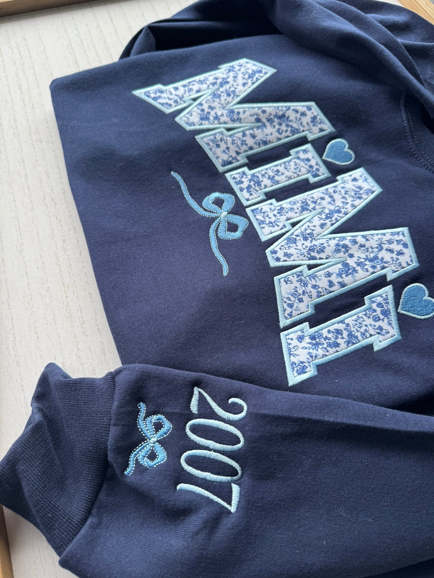 Personalized Blue Floral Appliqué Grandma Sweatshirt & Hoodie | Heart Detail | Custom Sleeve Names | MiMi Nana Gigi Gift