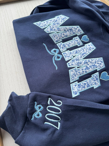 Personalized Blue Floral Appliqué Grandma Sweatshirt & Hoodie | Heart Detail | Custom Sleeve Names | MiMi Nana Gigi Gift
