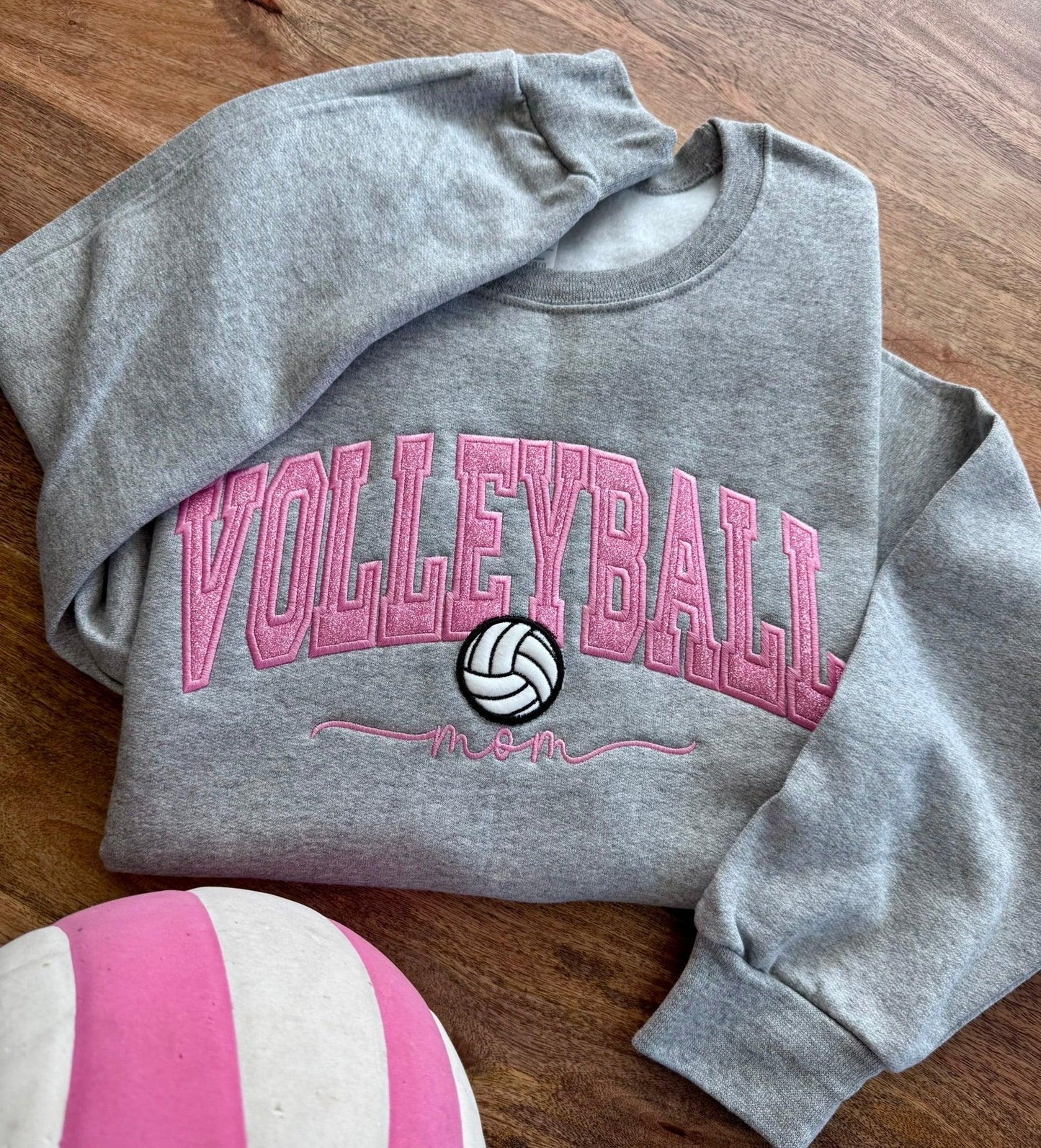 Gray sweatshirt with 'Volleyball Mom' text