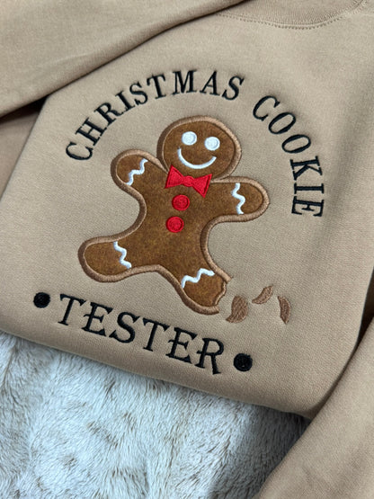 Front view of brown Christmas Cookie Tester embroidered sweatshirt with gingerbread design