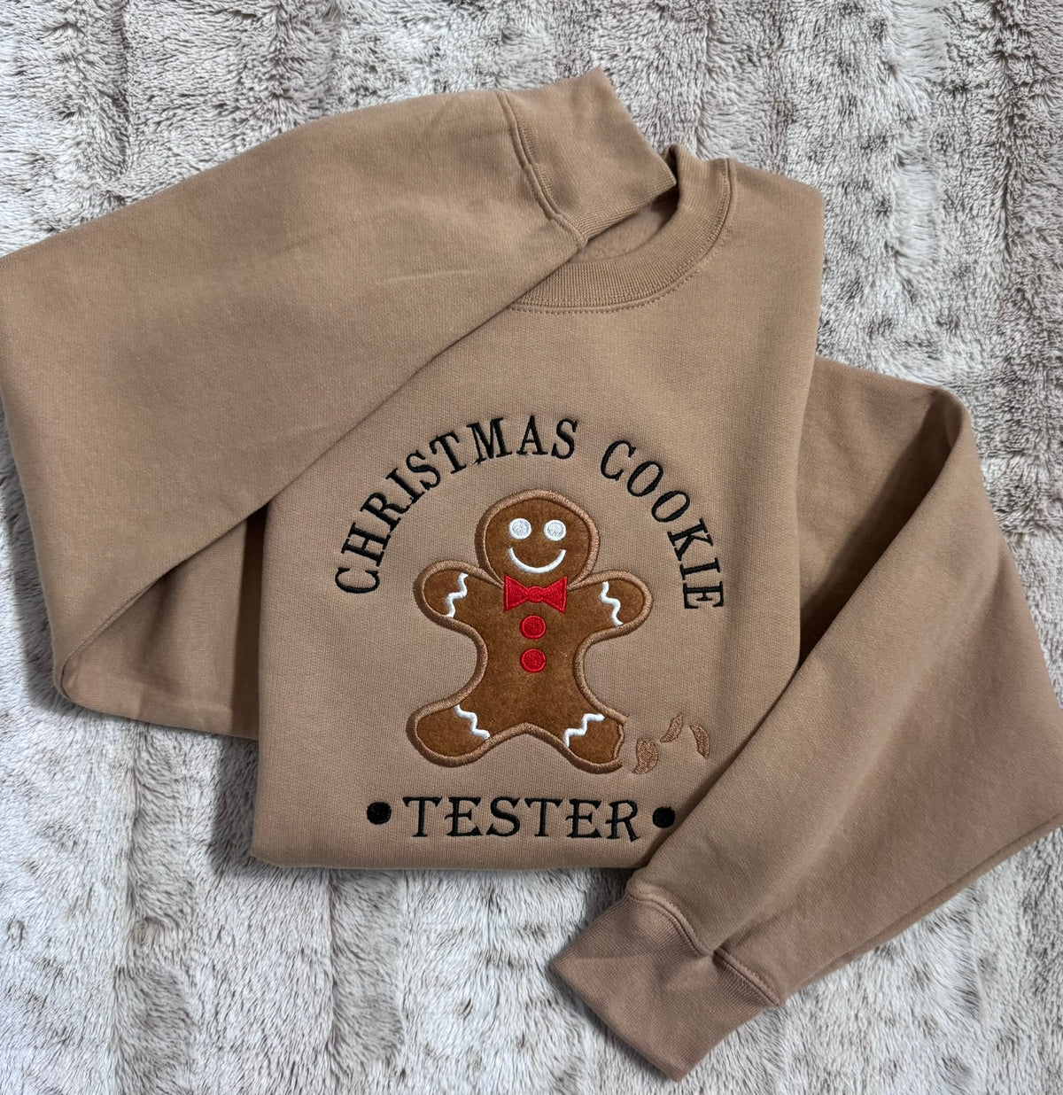 Christmas Cookie Tester sweatshirt detail showing premium gingerbread appliqué and embroidery